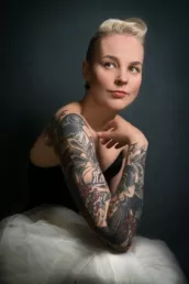 A woman with tattoo and blonde hair at a London photography studio