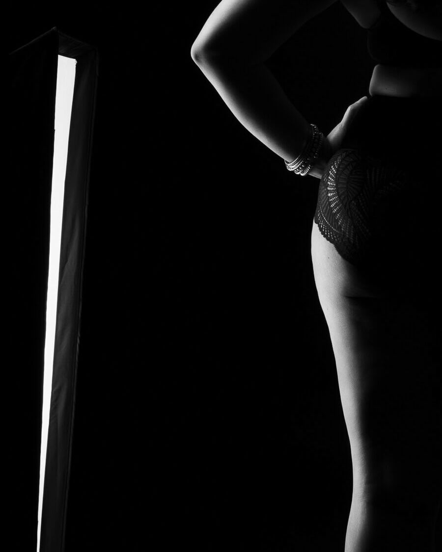 a tasteful nude photo using silhouette lighting