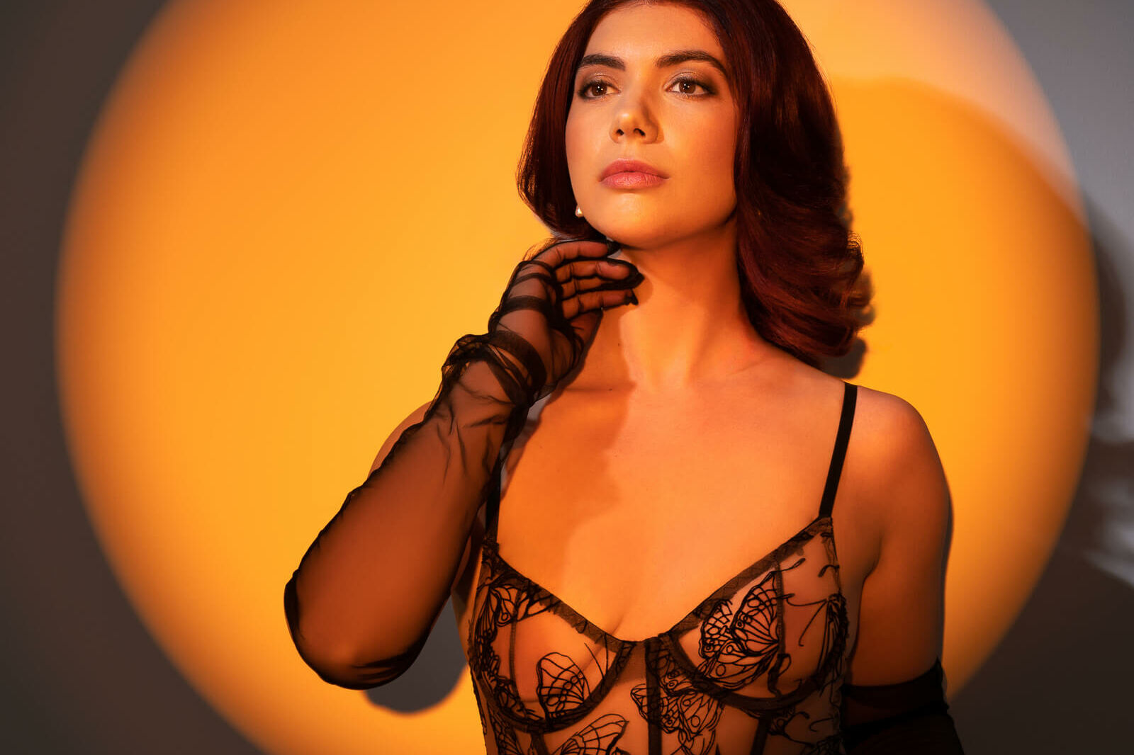 a black lacy bodysuit to help show where to buy boudoir outfits