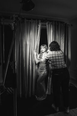 a behind the scenes of boudoir hair being prepped for a Hollywood boudoir photoshoot