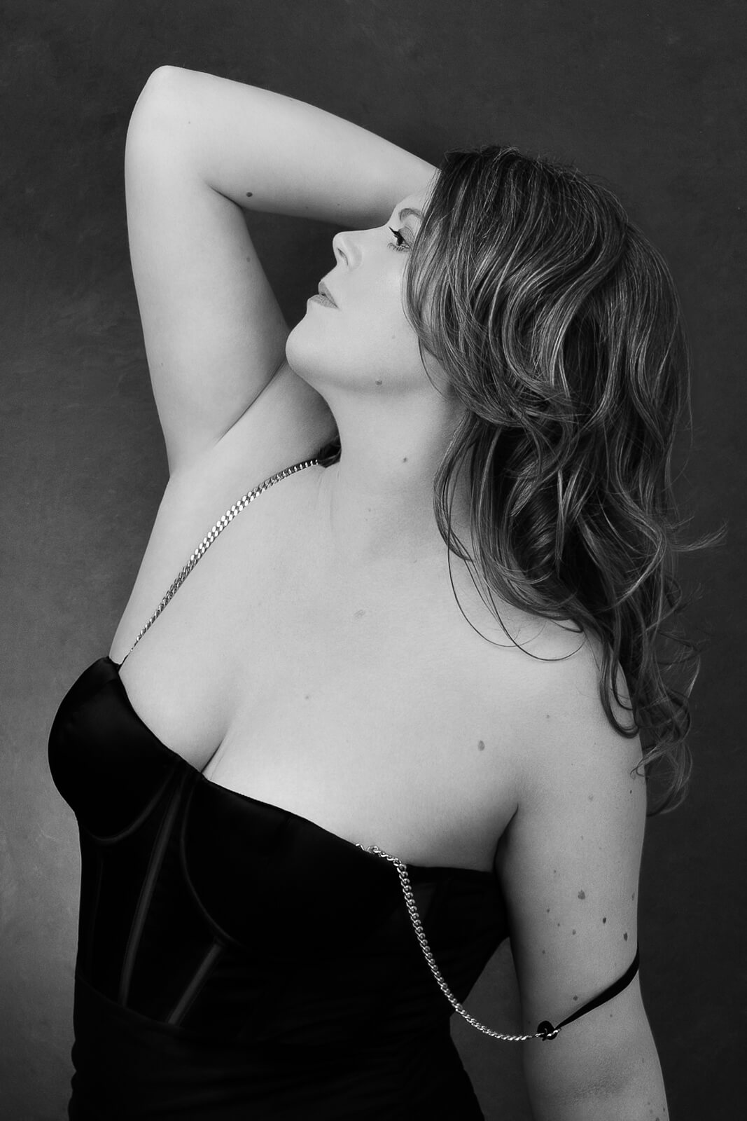 a female boudoir photographer in london in black and white