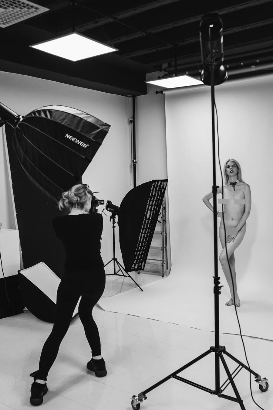 behind the scenes showing a professional female photographer teaching a workshop in London