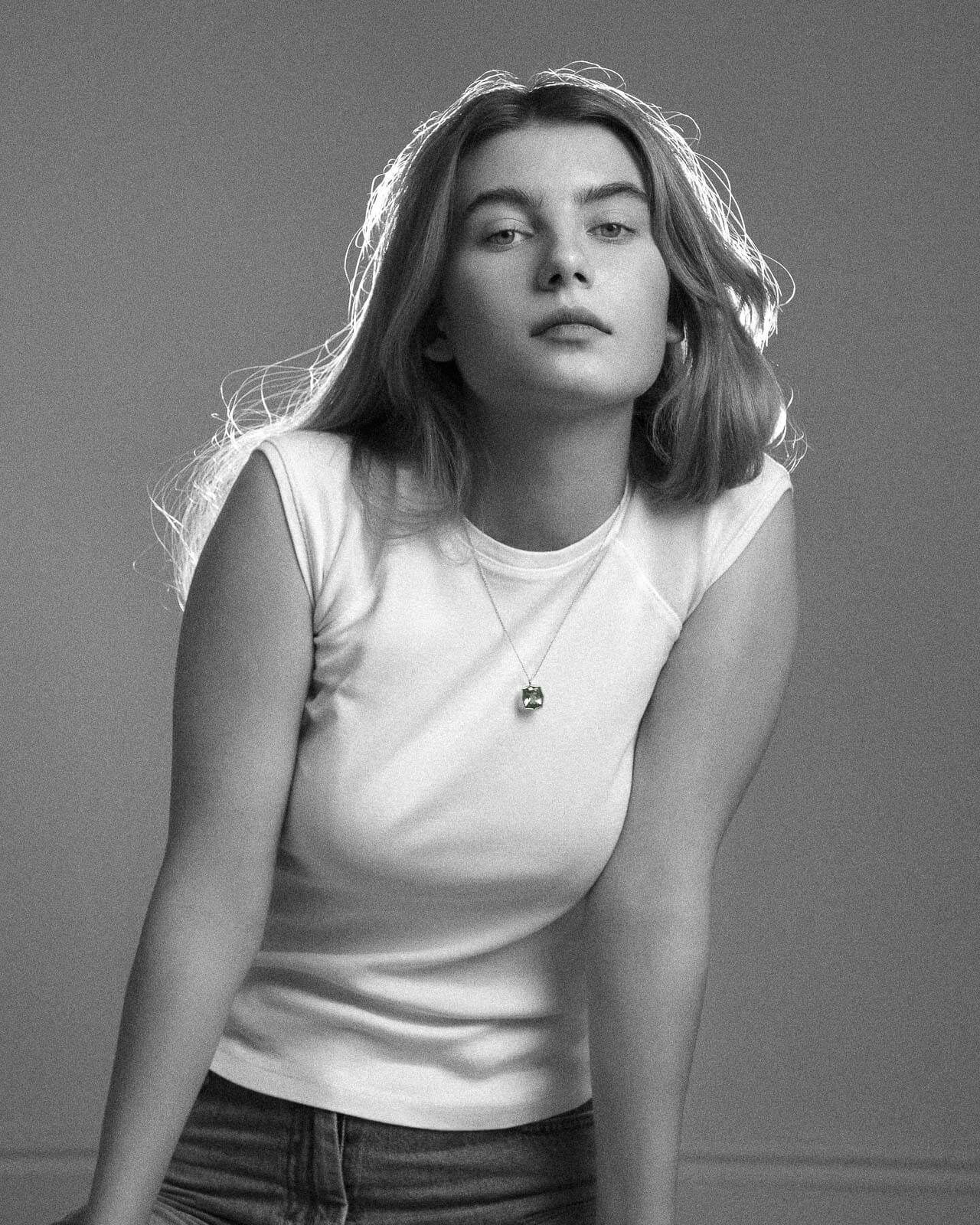 Black and white editorial-style studio portrait in London