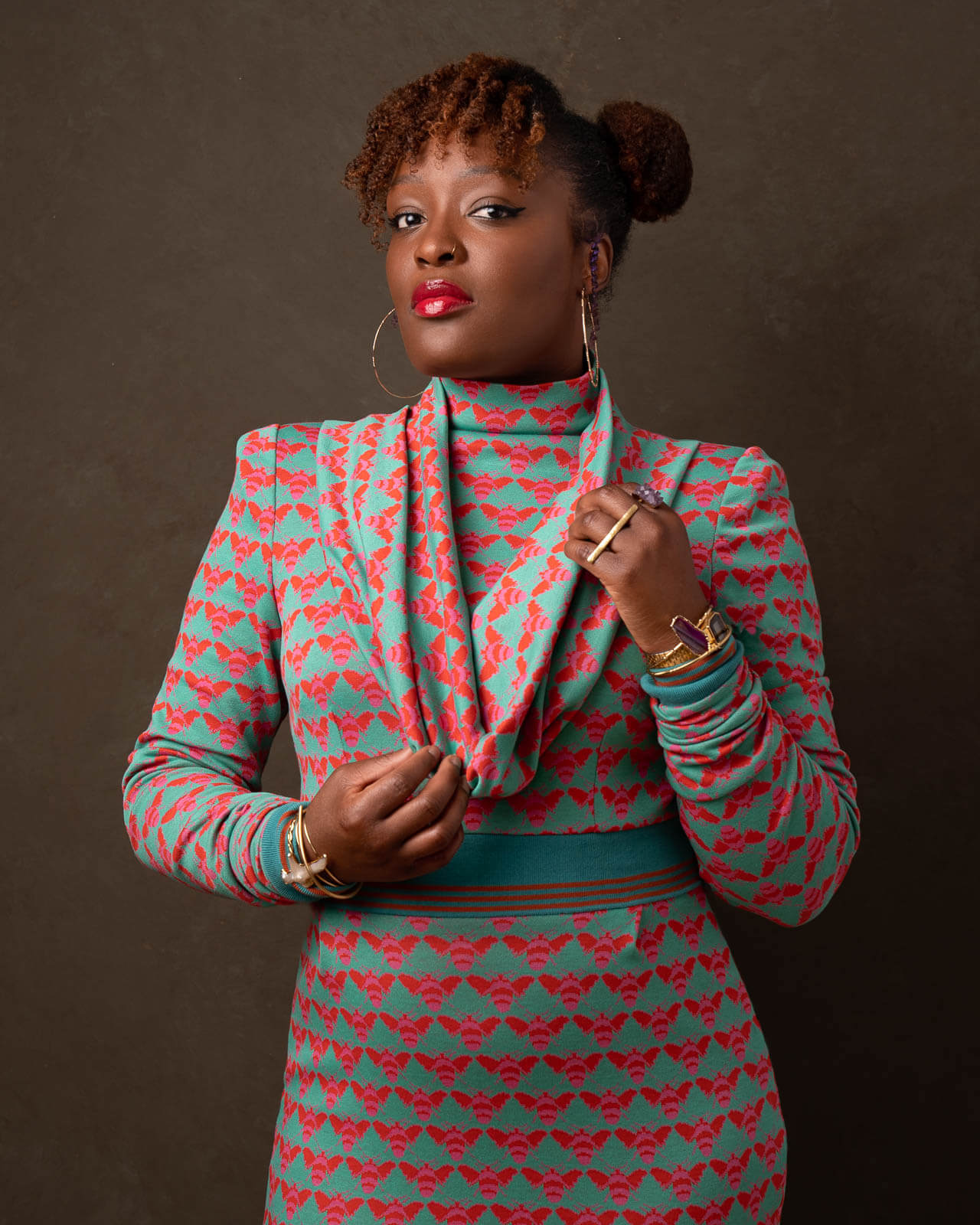Fashion editorial studio portrait in London with patterned suit