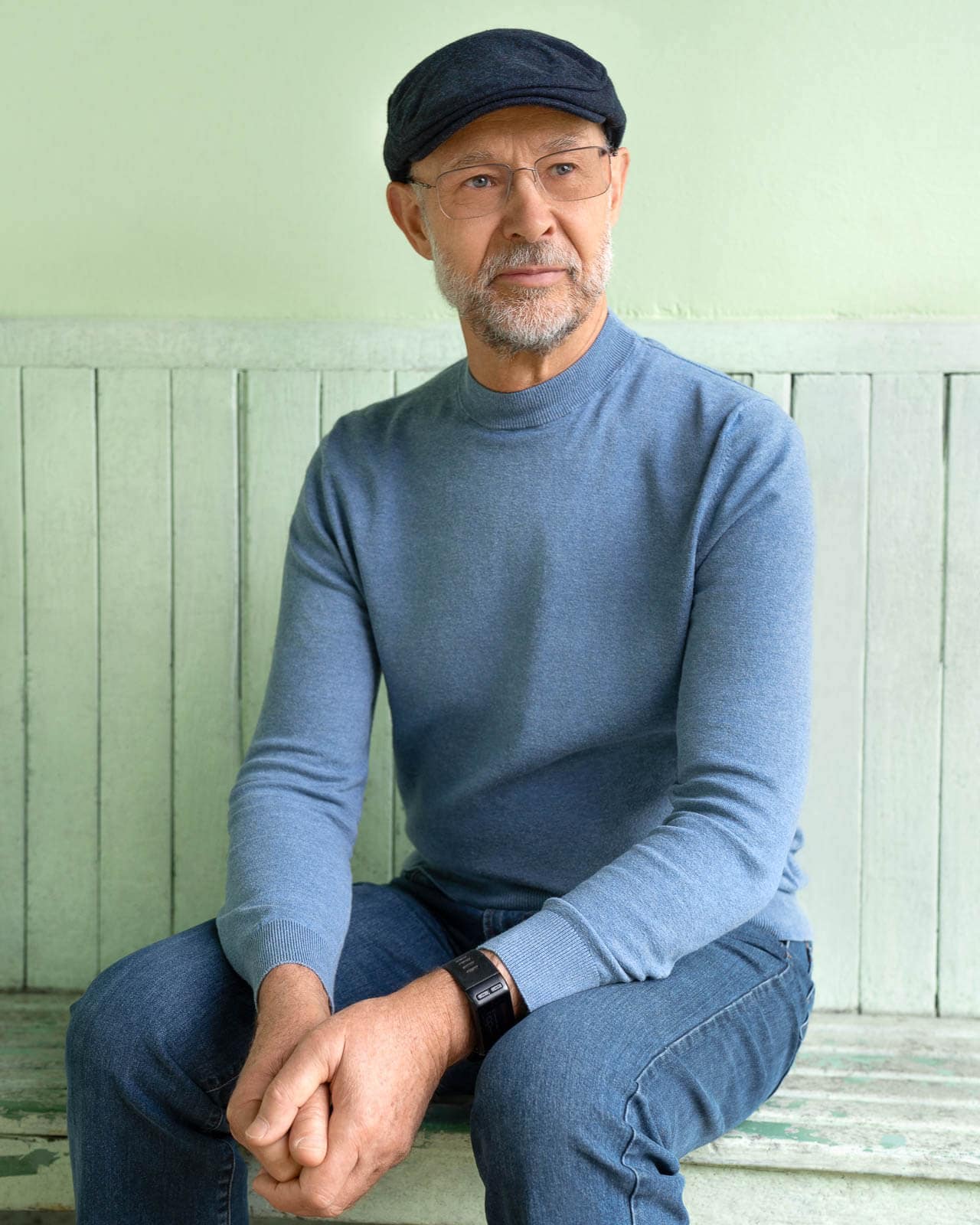 Warm, approachable studio portrait of an older man in London