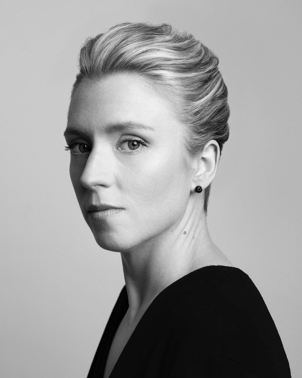 Professional headshot taken in a North London portrait studio